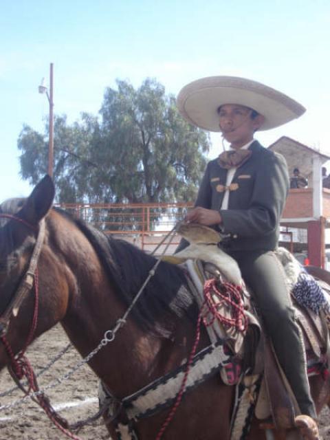 Pequeno gran integrante de la escolta